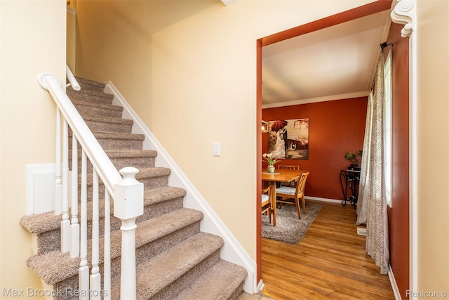 2655 Aspen Ln, Bloomfield Hills, MI 48302 - stairs featuring wood finished floors, baseboards, and crown molding