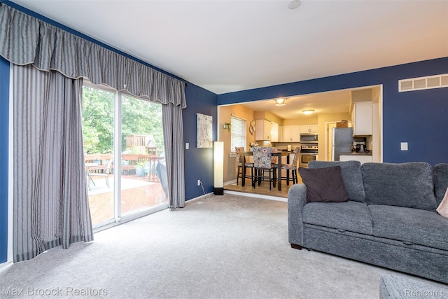 2655 Aspen Ln, Bloomfield Hills, MI 48302 - living area featuring light carpet and baseboards