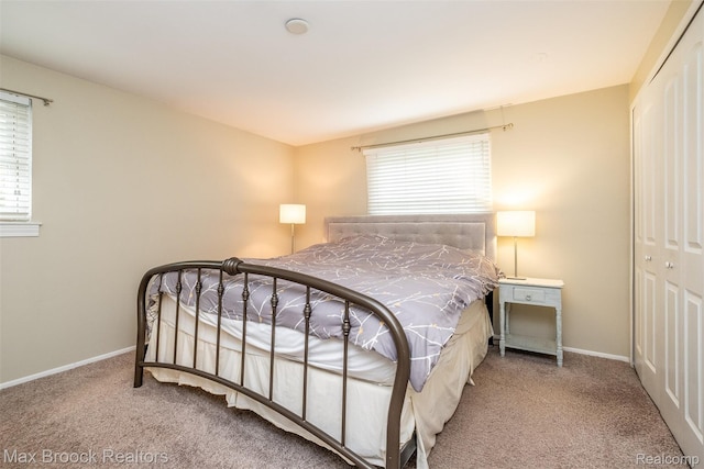 2655 Aspen Ln, Bloomfield Hills, MI 48302 - bedroom featuring carpet floors, a closet, and multiple windows
