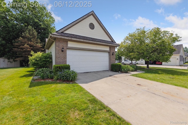 4311 Maplewood Meadows Ave, Grand Blanc, MI 48439 - view of front of house with brick siding, a garage, a front yard, and concrete driveway