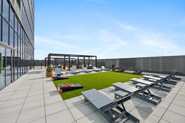 144 Oakes St SW Unit 2203, Grand Rapids, MI 49503 - view of patio / terrace featuring a pergola