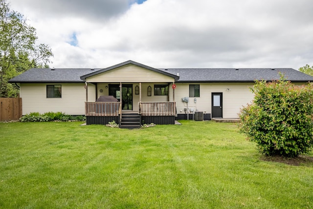 1655 E M 36, Pinckney, MI 48169 - rear view of house featuring a shingled roof and central AC