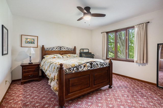 44 Bayshore Dr, Battle Creek, MI 49015 - bedroom with dark carpet, baseboards, and ceiling fan