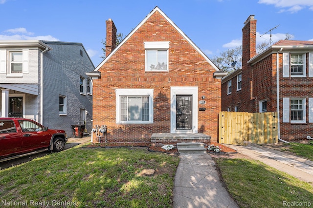 18691 Greenlawn St, Detroit, MI 48221 - view of front facade with brick siding and a chimney