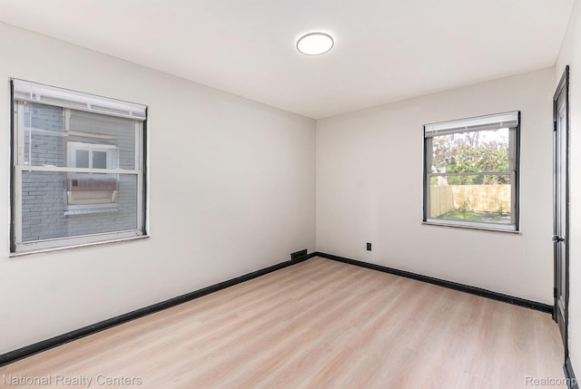 18691 Greenlawn St, Detroit, MI 48221 - unfurnished room featuring wood finished floors and baseboards