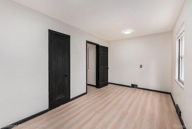 18691 Greenlawn St, Detroit, MI 48221 - unfurnished bedroom with light wood-type flooring and baseboards
