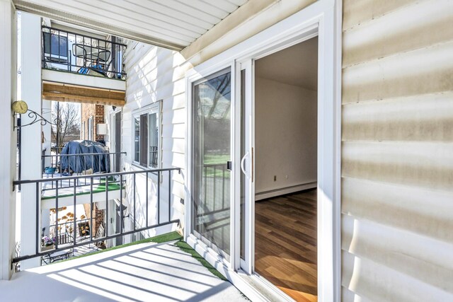 806 W Michigan Ave Unit 201E, Jackson, MI 49202 - balcony with a baseboard radiator