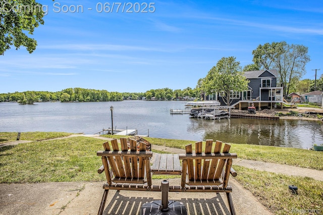 11393 Outer Dr, Pinckney, MI 48169 - view of patio featuring a water view and a boat dock