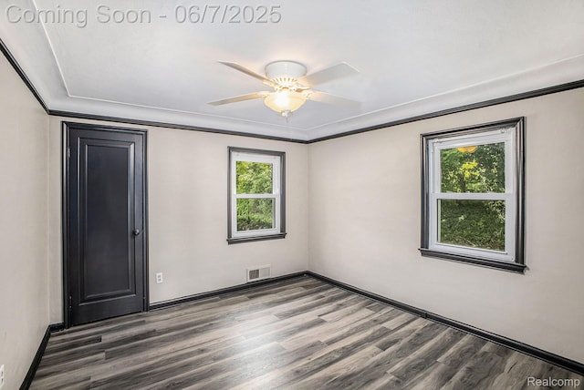 11393 Outer Dr, Pinckney, MI 48169 - unfurnished bedroom with crown molding, wood finished floors, baseboards, and ceiling fan