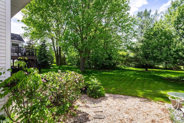 353 Golfside Dr, Lapeer, MI 48446 - view of green lawn featuring stairway and a deck