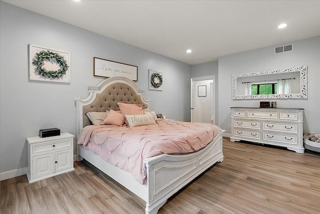 8011 Date Rd, Stevensville, MI 49127 - bedroom with light wood-style floors, recessed lighting, and baseboards