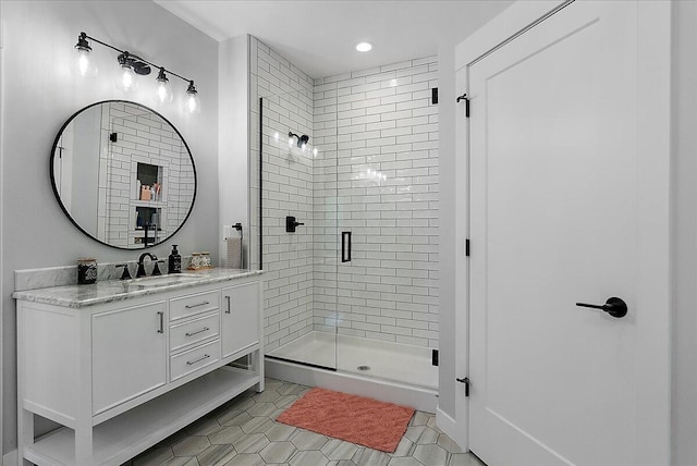 8011 Date Rd, Stevensville, MI 49127 - bathroom featuring vanity, a shower stall, tile patterned floors, and recessed lighting