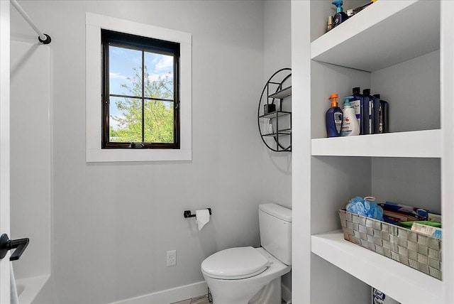 8011 Date Rd, Stevensville, MI 49127 - bathroom with toilet and baseboards