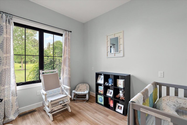 8011 Date Rd, Stevensville, MI 49127 - bedroom featuring light wood-style floors and baseboards