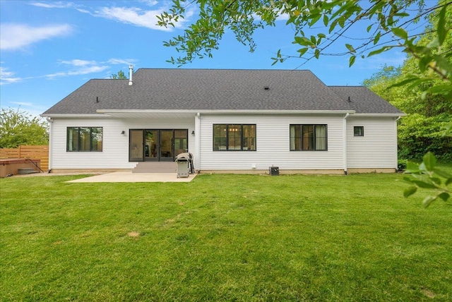 8011 Date Rd, Stevensville, MI 49127 - back of property with a patio area and roof with shingles