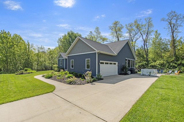 507 A Ave, South Haven, MI 49090 - view of side of home with driveway, an attached garage, and a yard