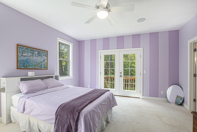 507 A Ave, South Haven, MI 49090 - carpeted bedroom with french doors, access to outside, baseboards, wallpapered walls, and a ceiling fan