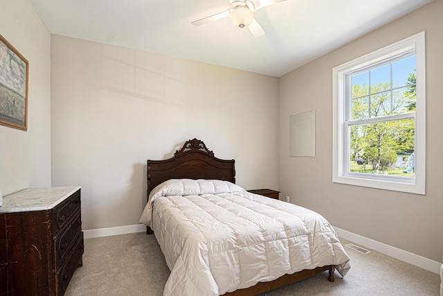 507 A Ave, South Haven, MI 49090 - bedroom featuring light colored carpet, baseboards, and a ceiling fan