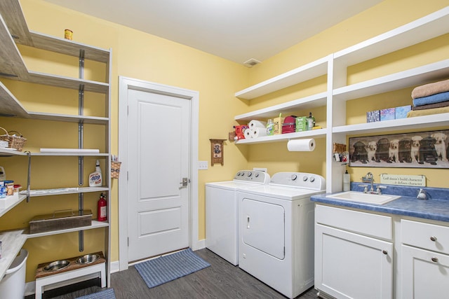 507 A Ave, South Haven, MI 49090 - laundry room with washer and dryer, dark wood-style floors, and cabinet space