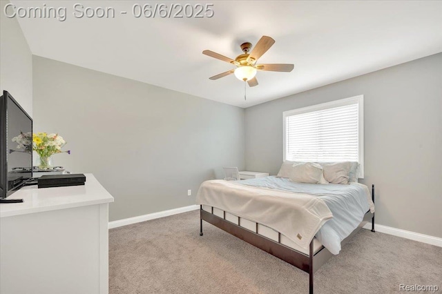 343 Hidden Riv E, Holly, MI 48442 - bedroom featuring light carpet, baseboards, and a ceiling fan