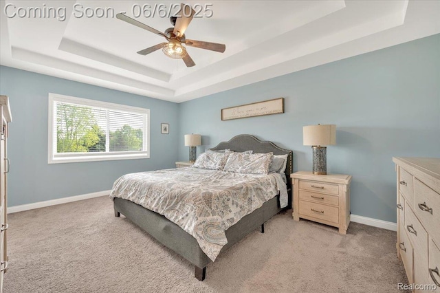 343 Hidden Riv E, Holly, MI 48442 - bedroom with a raised ceiling, light carpet, and baseboards