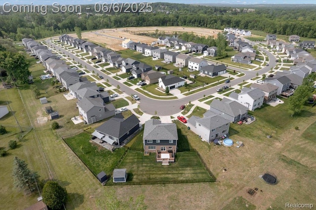343 Hidden Riv E, Holly, MI 48442 - aerial overview of property's location with nearby suburban area and a forest