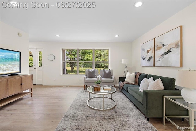 9248 Riverside Dr, Brighton, MI 48116 - living area featuring wood finished floors and recessed lighting