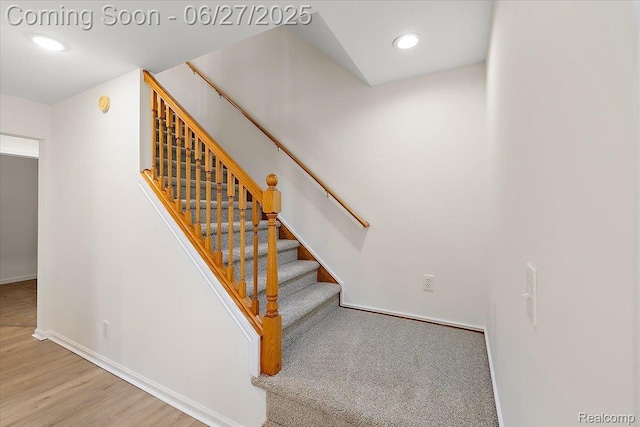 9248 Riverside Dr, Brighton, MI 48116 - stairway featuring recessed lighting and wood finished floors