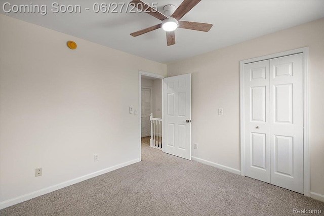 9248 Riverside Dr, Brighton, MI 48116 - unfurnished bedroom with carpet, a closet, and a ceiling fan