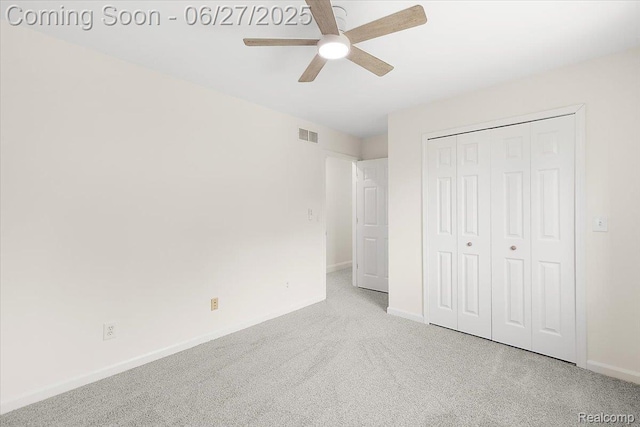 9248 Riverside Dr, Brighton, MI 48116 - unfurnished bedroom featuring carpet, a closet, and a ceiling fan