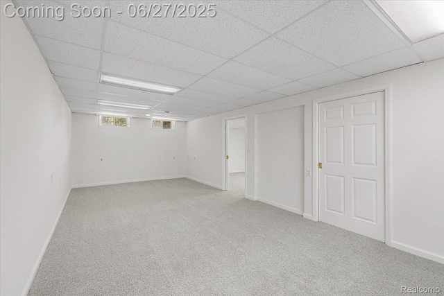 9248 Riverside Dr, Brighton, MI 48116 - below grade area with a drop ceiling and carpet