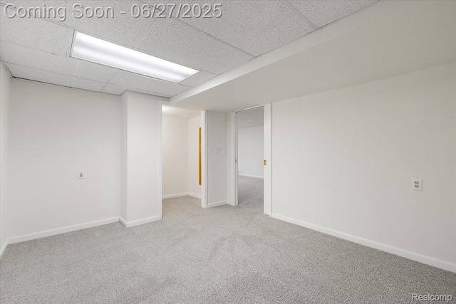 9248 Riverside Dr, Brighton, MI 48116 - finished below grade area featuring a paneled ceiling and carpet