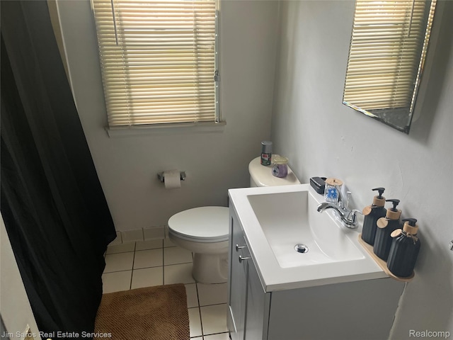 8810 Farmbrook St, Grosse Pointe, MI 48224 - bathroom featuring vanity, tile patterned flooring, and toilet
