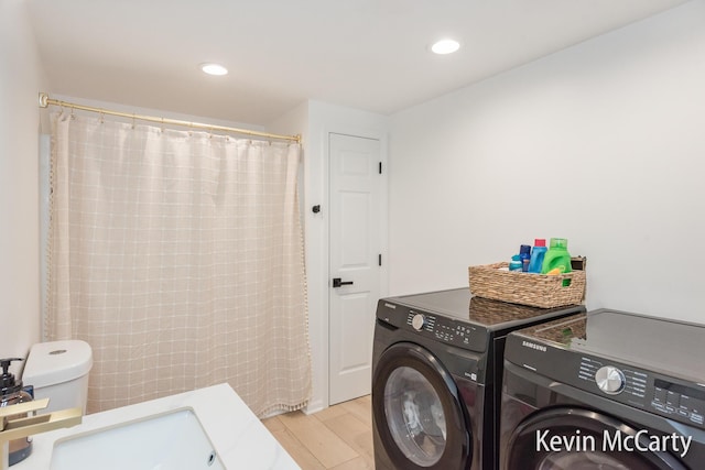 1731 Edgewood Ave SE, Grand Rapids, MI 49506 - laundry area with washing machine and clothes dryer and recessed lighting