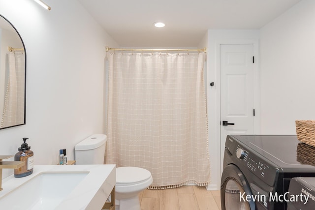 1731 Edgewood Ave SE, Grand Rapids, MI 49506 - bathroom featuring toilet, vanity, recessed lighting, and a shower with curtain