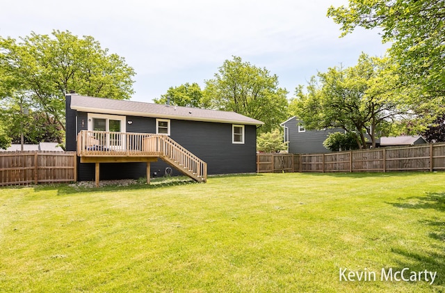1731 Edgewood Ave SE, Grand Rapids, MI 49506 - rear view of property with a deck, a chimney, and stairway