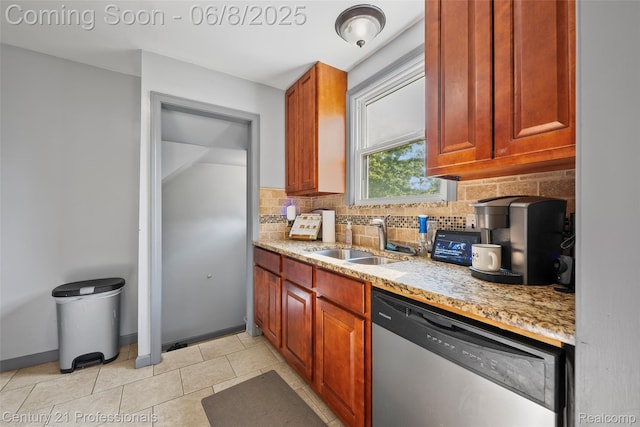 22601 Colony St, Saint Clair Shores, MI 48080 - kitchen with stainless steel dishwasher, a sink, tasteful backsplash, light stone counters, and light tile patterned floors