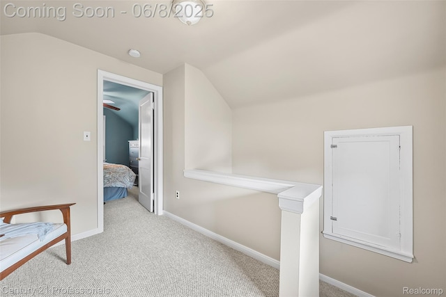 22601 Colony St, Saint Clair Shores, MI 48080 - hall featuring vaulted ceiling, carpet, an upstairs landing, and baseboards