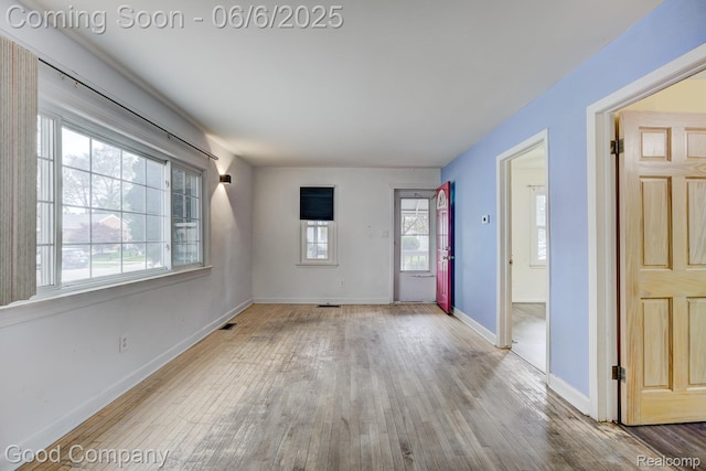 27410 Groveland St, Madison Heights, MI 48071 - unfurnished living room featuring hardwood / wood-style floors and baseboards