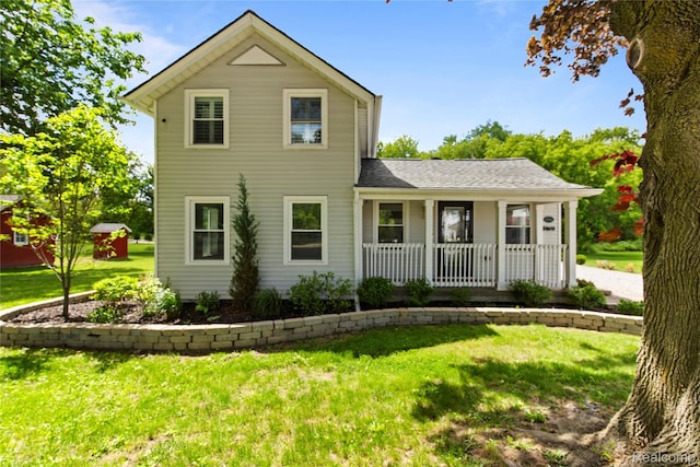 5164 Plymouth Rd, Ann Arbor, MI 48105 - view of front of house with covered porch and a front yard