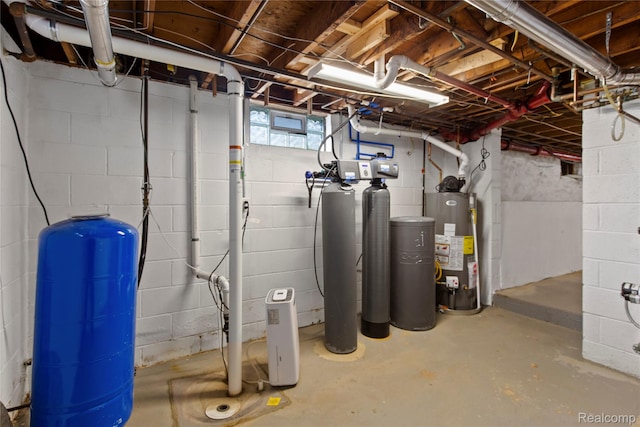5164 Plymouth Rd, Ann Arbor, MI 48105 - below grade area featuring a water pressure tank, gas water heater, and a water softener
