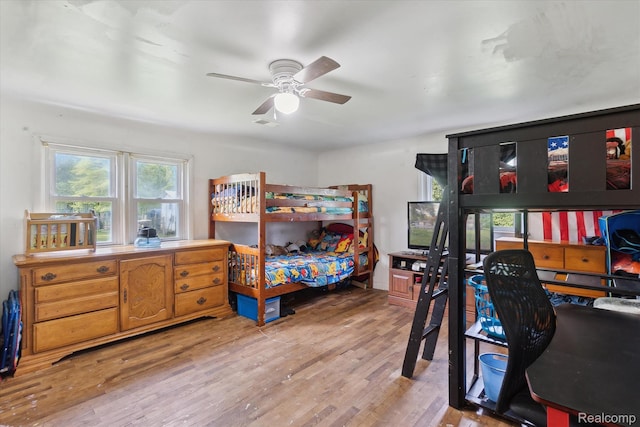 4828 Rathbun Rd, Birch Run, MI 48415 - bedroom featuring wood finished floors and ceiling fan