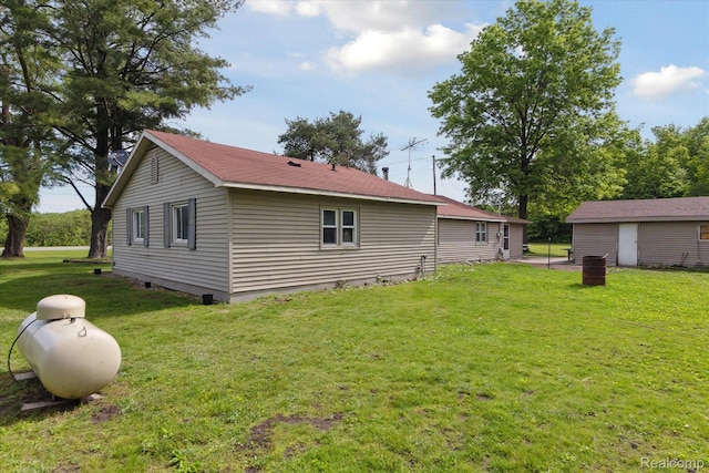 4828 Rathbun Rd, Birch Run, MI 48415 - back of house with a lawn