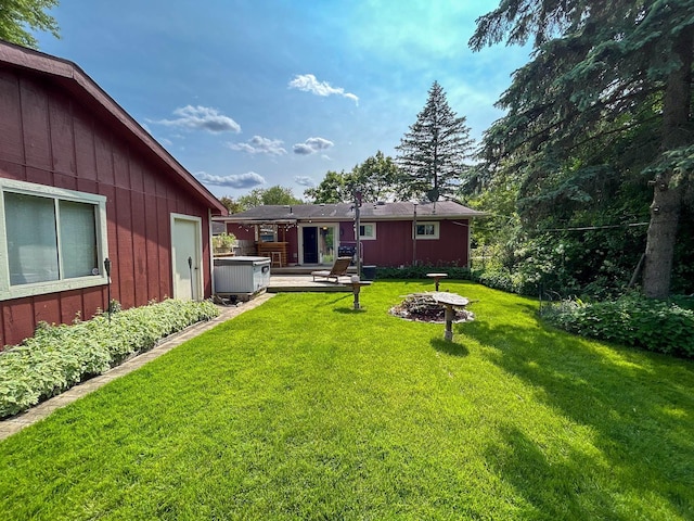 2069 Kenwood Dr, Flint, MI 48532 - view of green lawn featuring a wooden deck