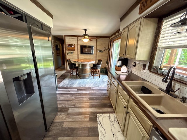2069 Kenwood Dr, Flint, MI 48532 - kitchen with stainless steel fridge with ice dispenser, a sink, a ceiling fan, decorative backsplash, and plenty of natural light