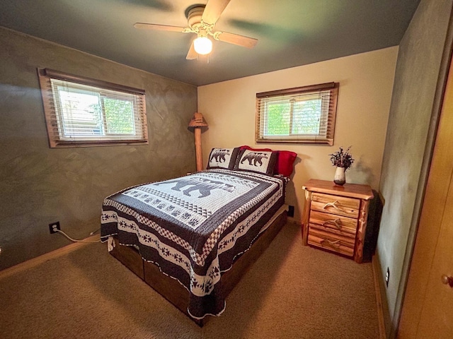 2069 Kenwood Dr, Flint, MI 48532 - bedroom with a ceiling fan and carpet floors