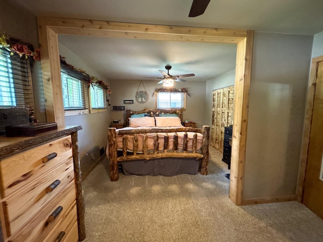 2069 Kenwood Dr, Flint, MI 48532 - carpeted bedroom with multiple windows and ceiling fan