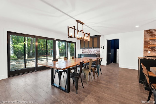 5080 Tootmoor Rd, Bloomfield Hills, MI 48302 - dining area with a chandelier, dark wood-type flooring, and baseboards