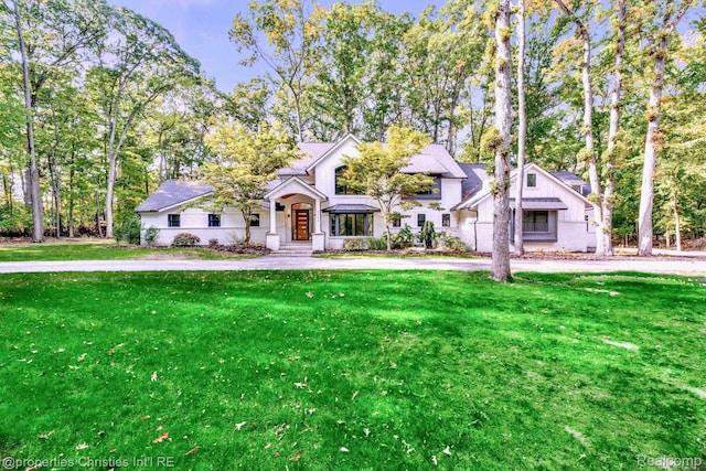 5080 Tootmoor Rd, Bloomfield Hills, MI 48302 - view of front of property with a front lawn