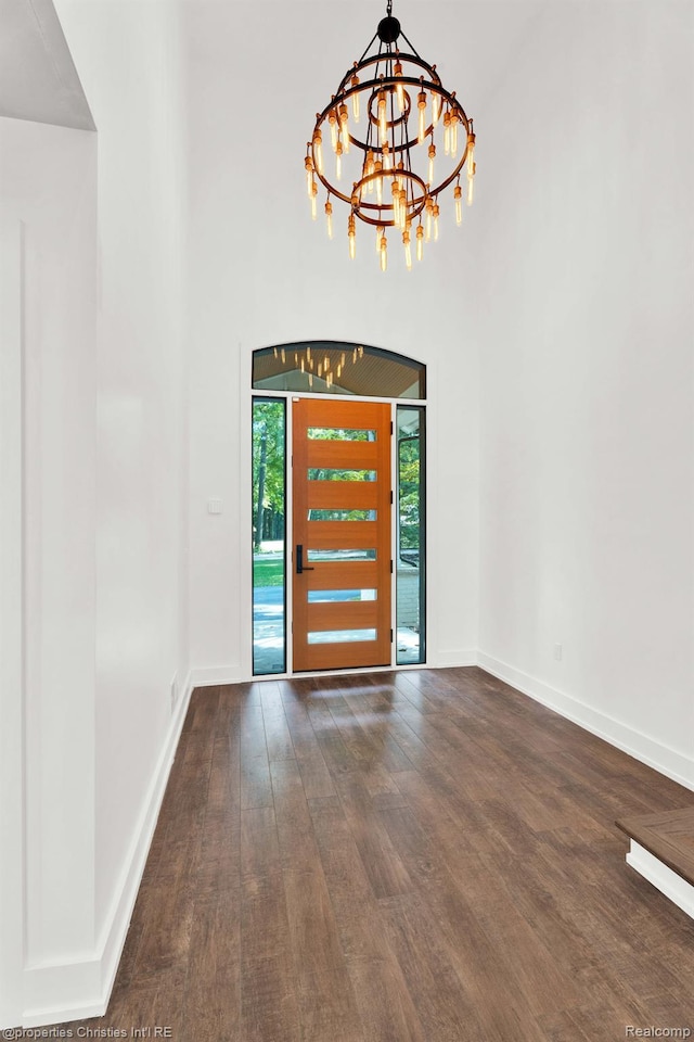 5080 Tootmoor Rd, Bloomfield Hills, MI 48302 - entryway with wood finished floors, a chandelier, and baseboards
